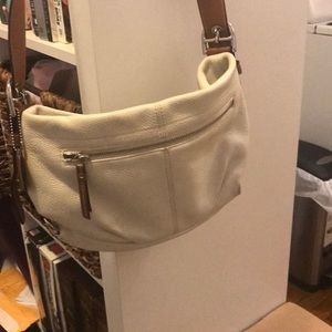 White leather coach bag.
